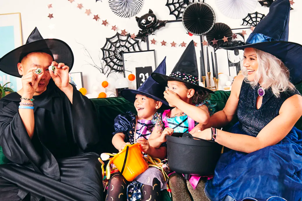A family dressed up as witches for Halloween