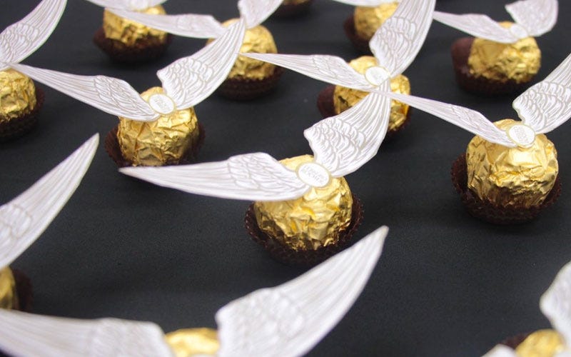 How to Make Ferrero Rocher Golden Snitches Ferrero Rocher Golden Snitches + Free Printables