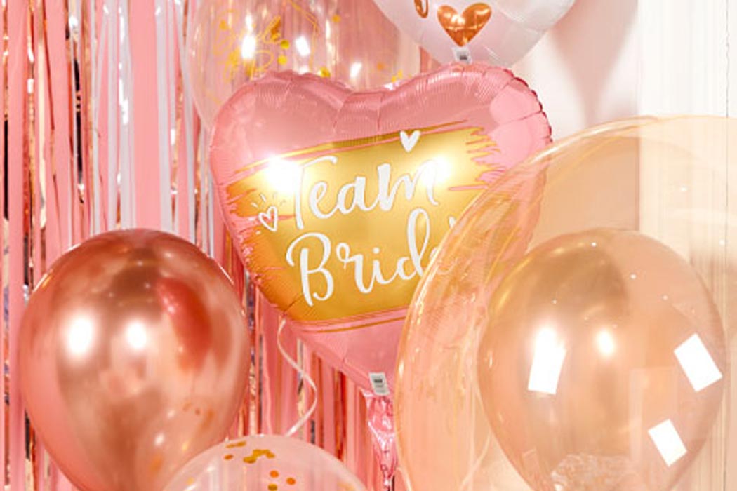 Bride to be bunting hanging in front of a pool on a sunny day