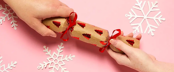 Homemade Christmas crackers made with brown kraft paper