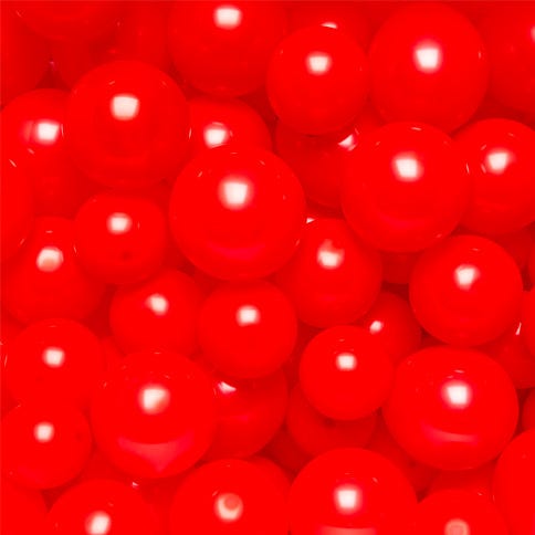 A picture filled with small inflated bright red shiny balloons