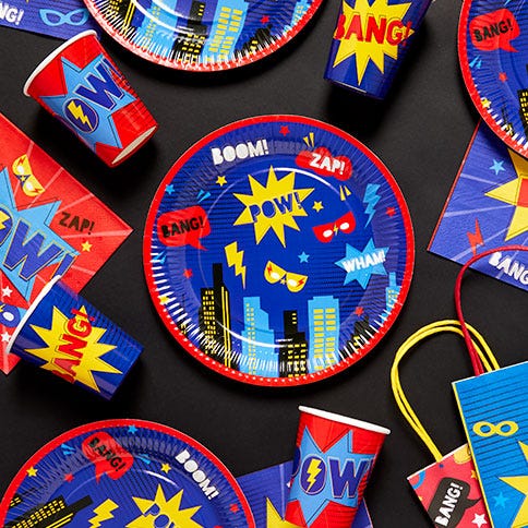 comic book themed paper plates and superhero party bags