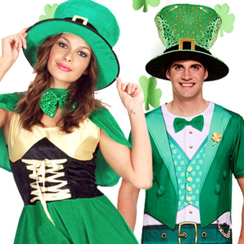 A man and woman dressed in green leprechaun costumes