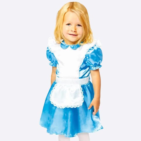 Toddler dressed in blue dress with white pinafore as Alice in Wonderland