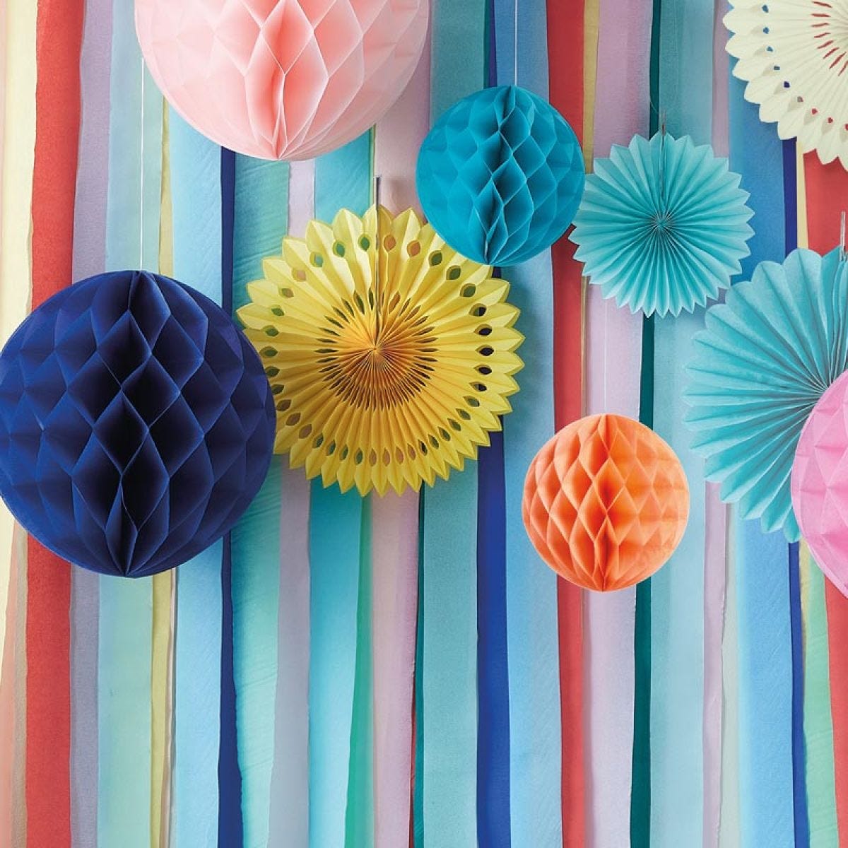 Multicoloured Streamer Backdrop with Honeycombs & Fans