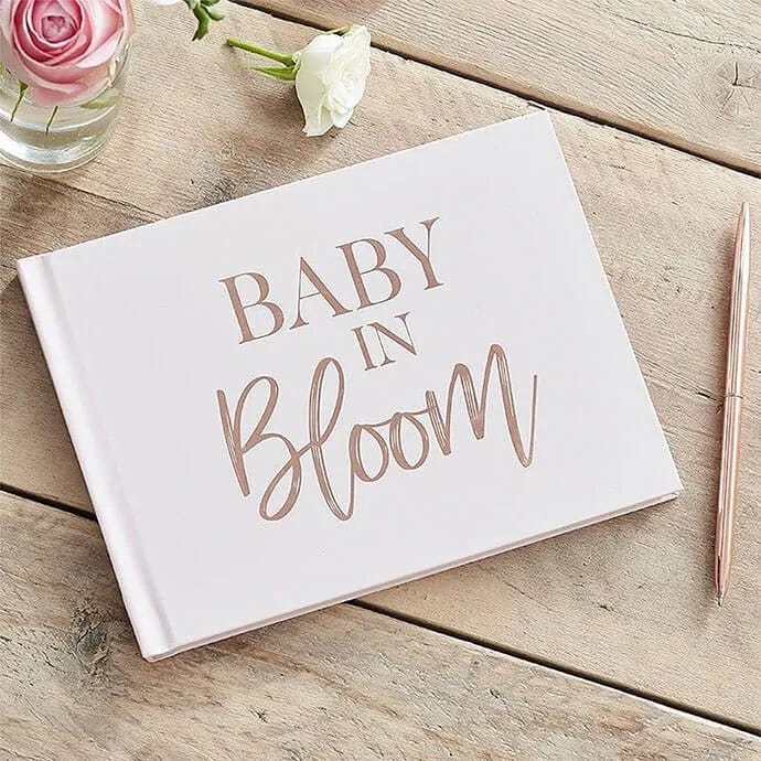 Baby shower guest book Baby shower guest book that says 'baby in bloom' on the cover