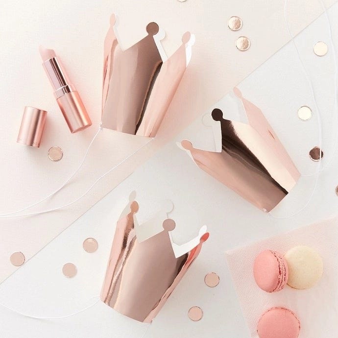 Rose gold party hats shaped like crowns