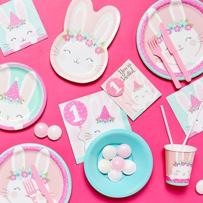 rabbit shaped plates on a pink background