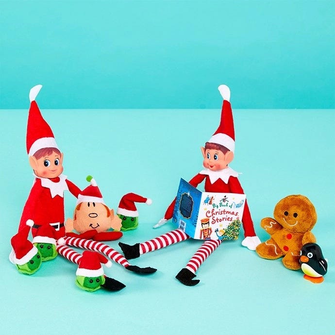 Elf on the Shelf reading a Christmas story