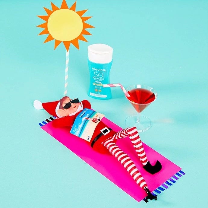 Elf on the Shelf sunbathing