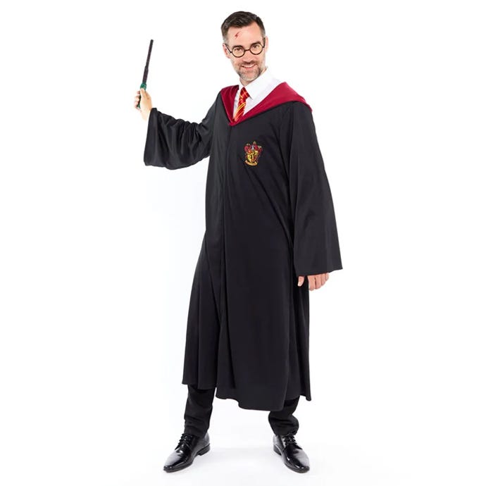 Man dressed as Harry Potter with robe, scar and wand