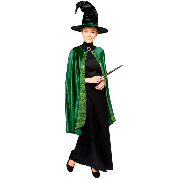 woman dressed in green robe with witch hat