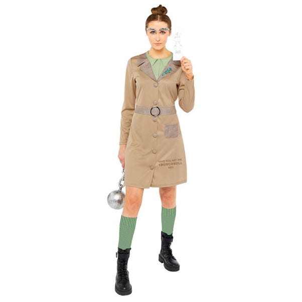 Woman in beige coat with top knot posing as miss trunchbull