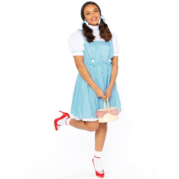 woman dressed as Dorothy with blue and white checked pinafore dress