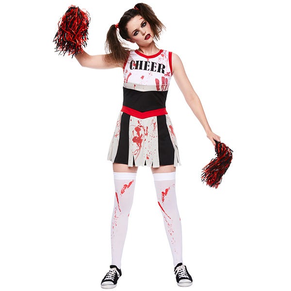Woman dressed in red and black cheerleader outfit with fake blood stains